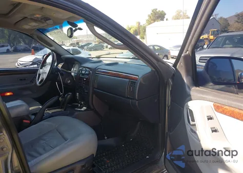 2003 Jeep Grand Cherokee Overland из США, поврежденный, VIN 1J8GW68J13C545620